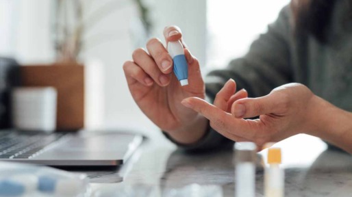 Cropped Shot Of Young Woman Doing Finger-prink Blood Test At Home