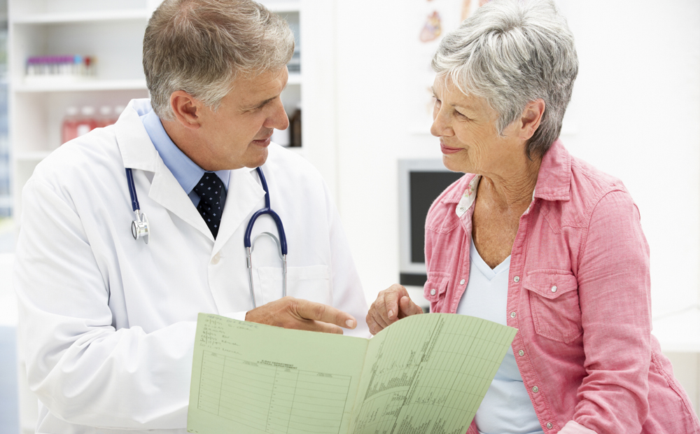 Doctor with female patient