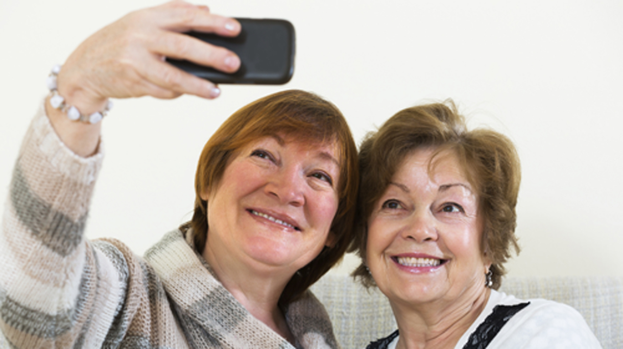 Female pensioners making selfie