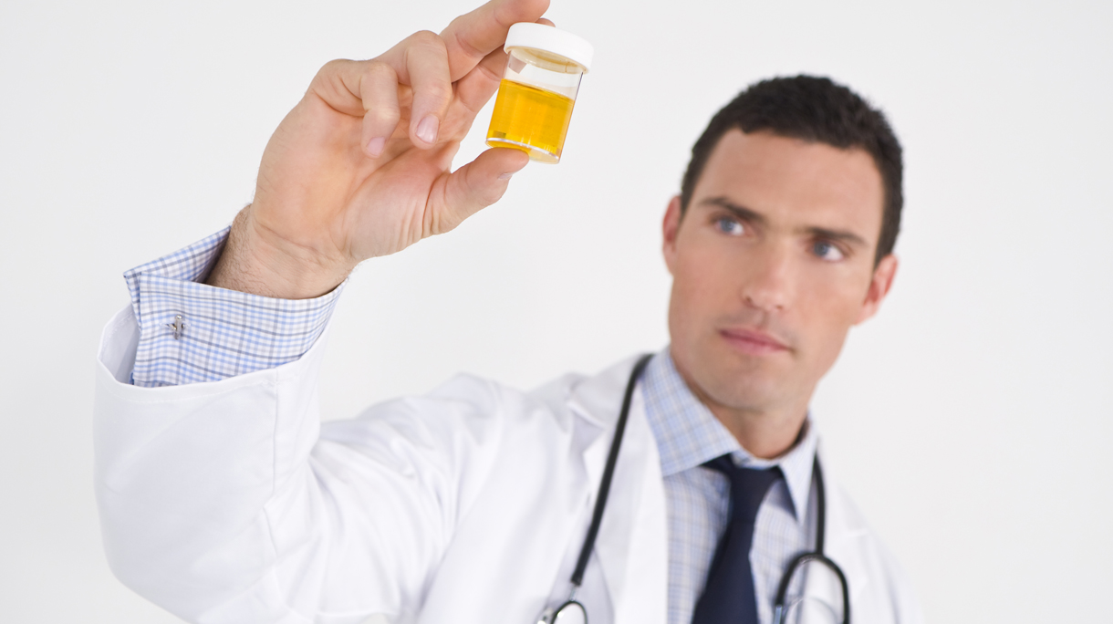 Concerned Doctor With Sample