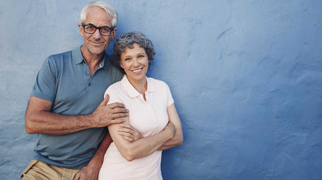 Happy mature couple standing together
