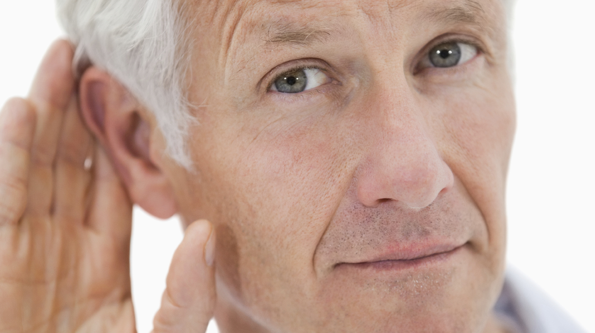 Portrait of a man giving his ear