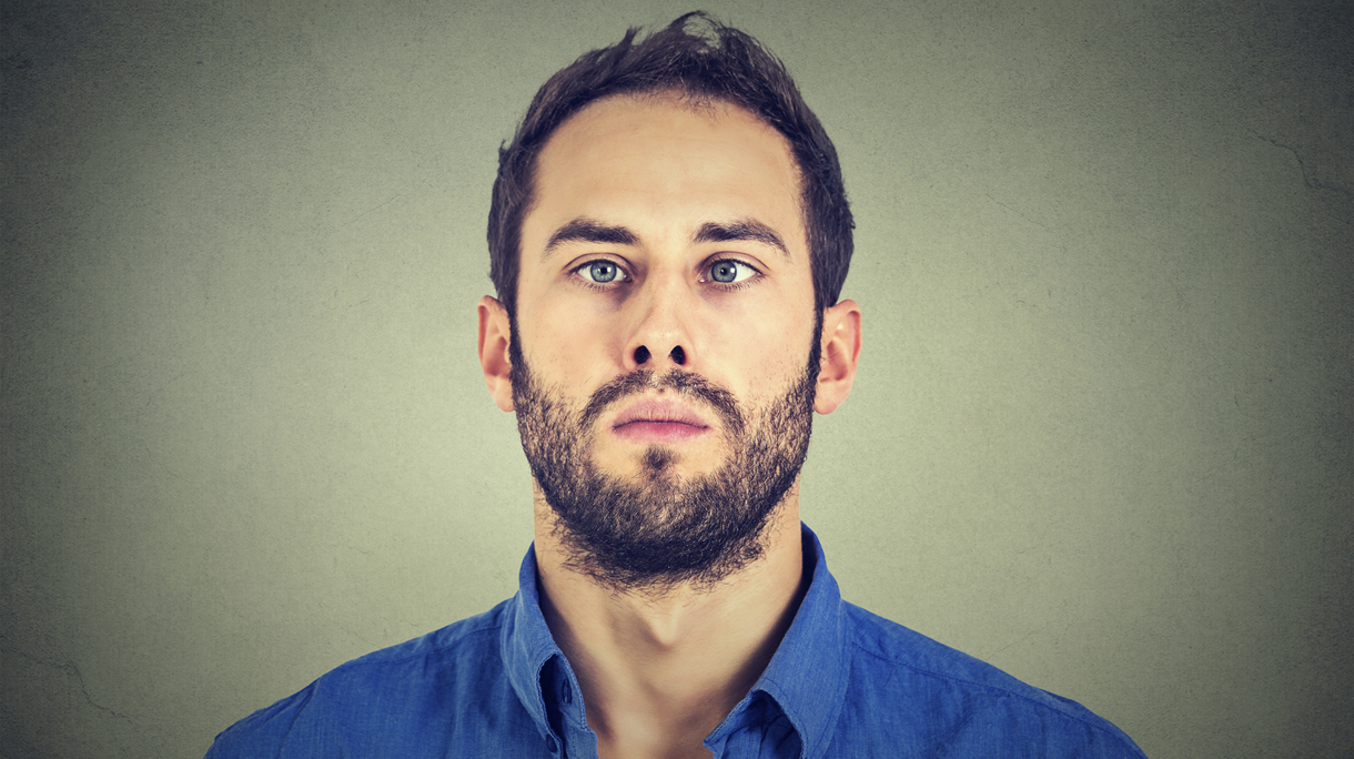 Closeup portrait of a cross-eyed man
