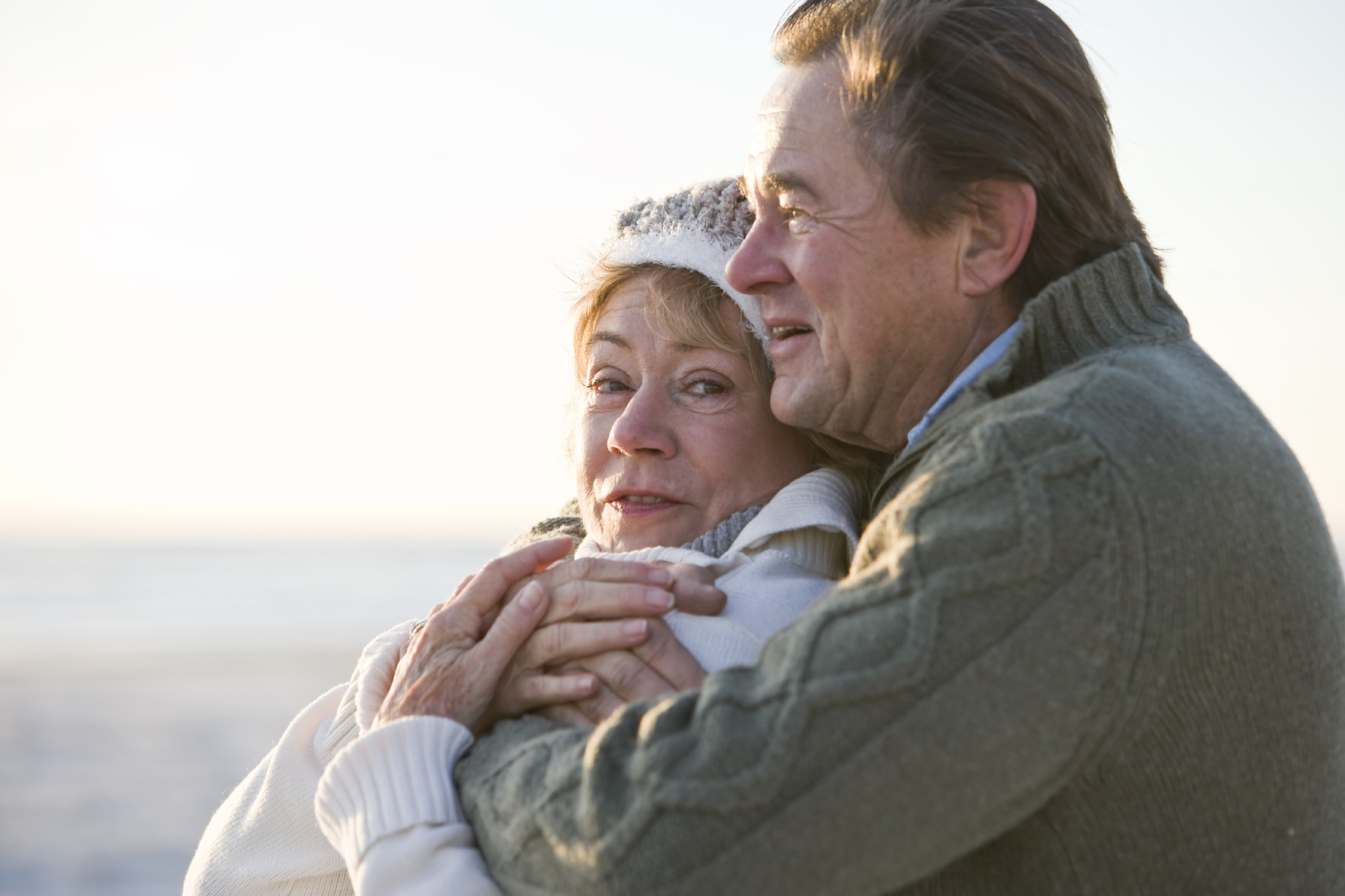 Close up of affectionate mature couple hugging