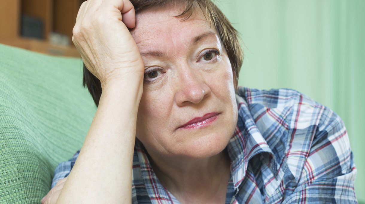 Portrait of sad mature woman