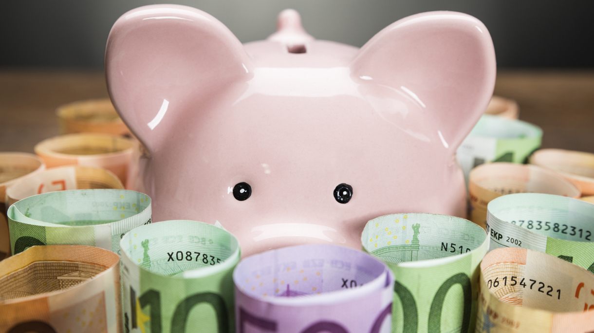 Piggybank Surrounded With Euro Banknotes