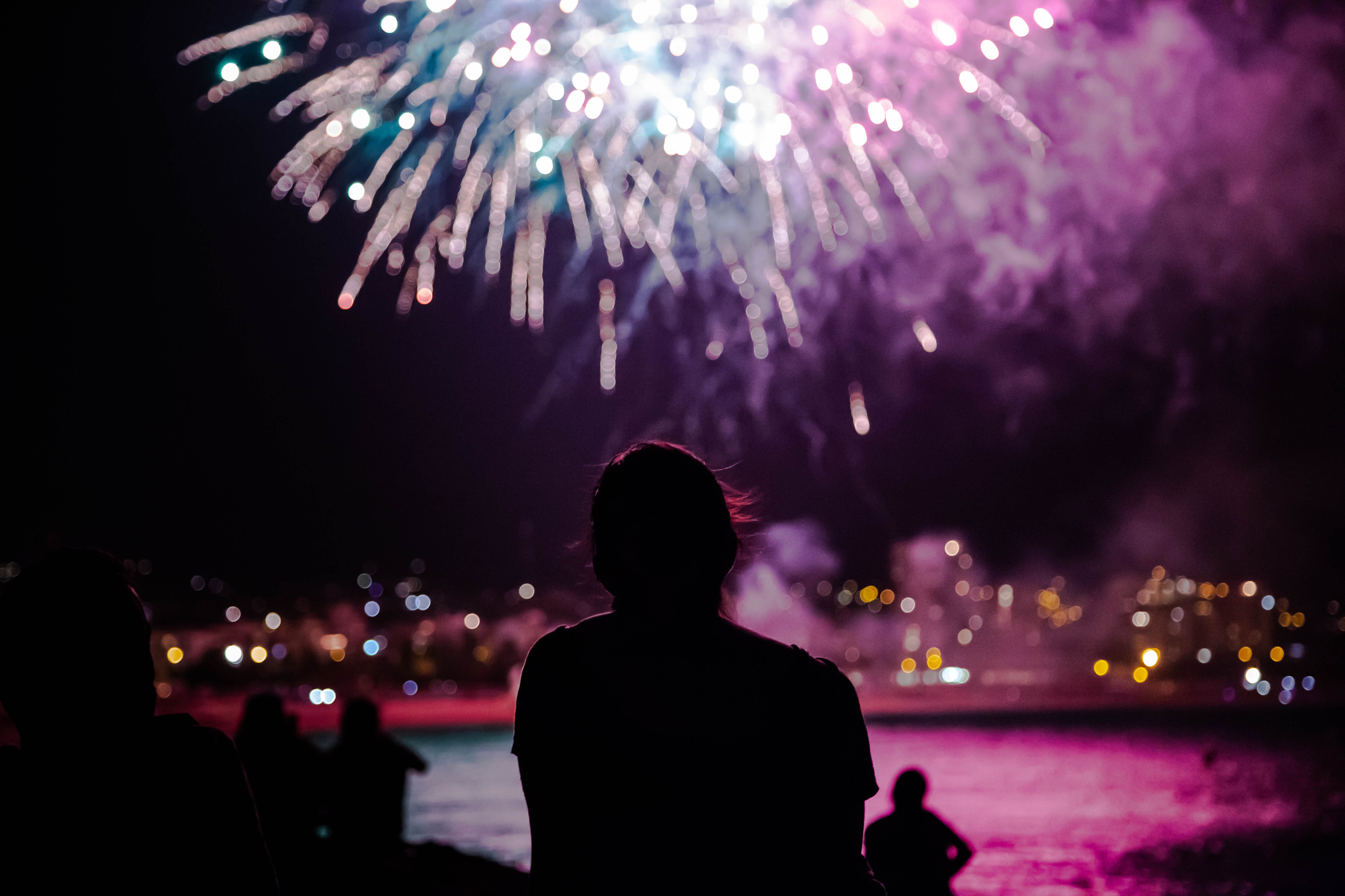 People contemplating fireworks.