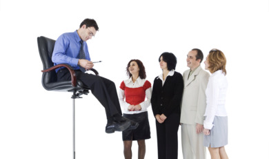 Business guru speaking to people