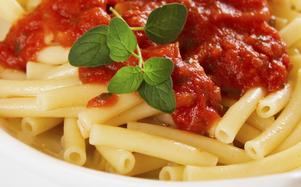 Italian macaroni pasta with tomato sauce
