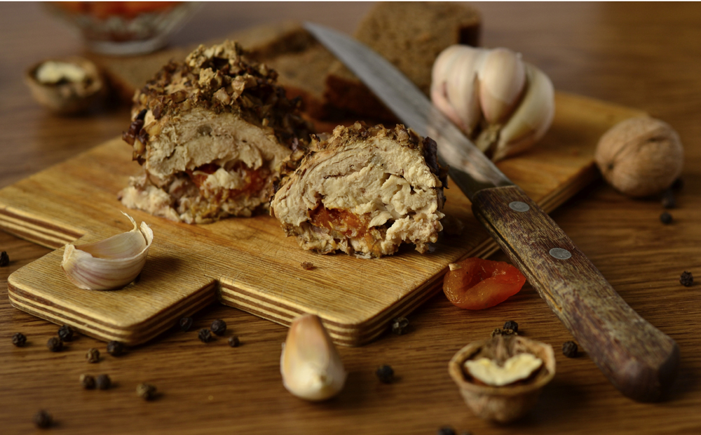 Chicken roll with dried apricots in nut crumbed