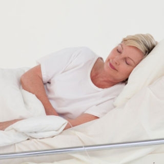 vrouw-ziekenhuisbed_320x320_0