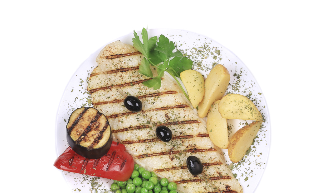 Grilled fish fillet with tasty vegetables.