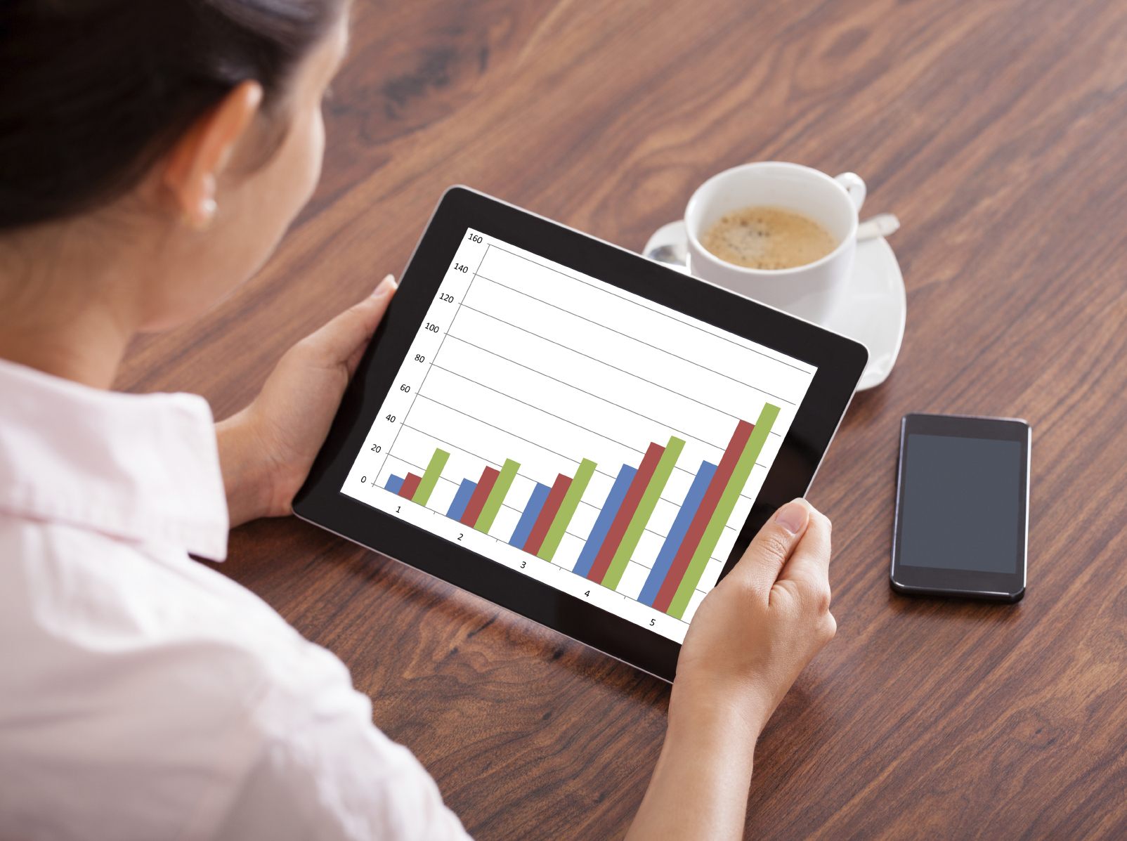 Woman With Digital  Tablet And Mobile Phone