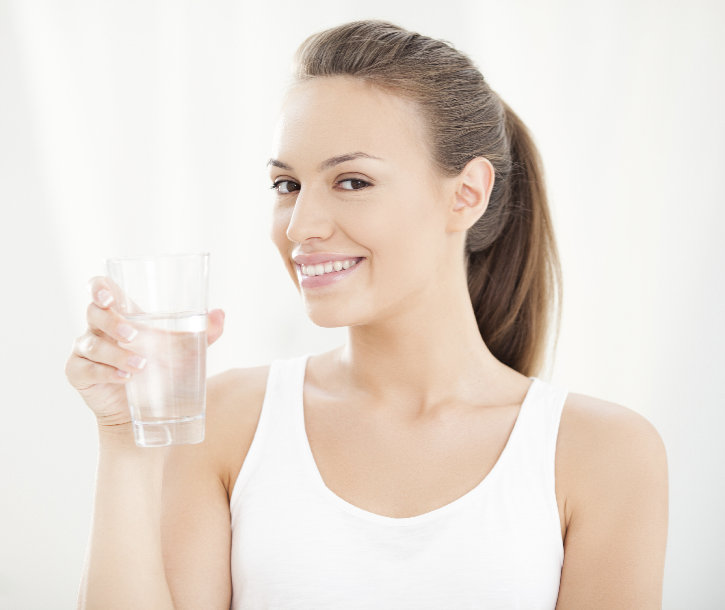 Young Woman With a Glass of Water