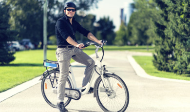 Businessman using bicycle sharing system