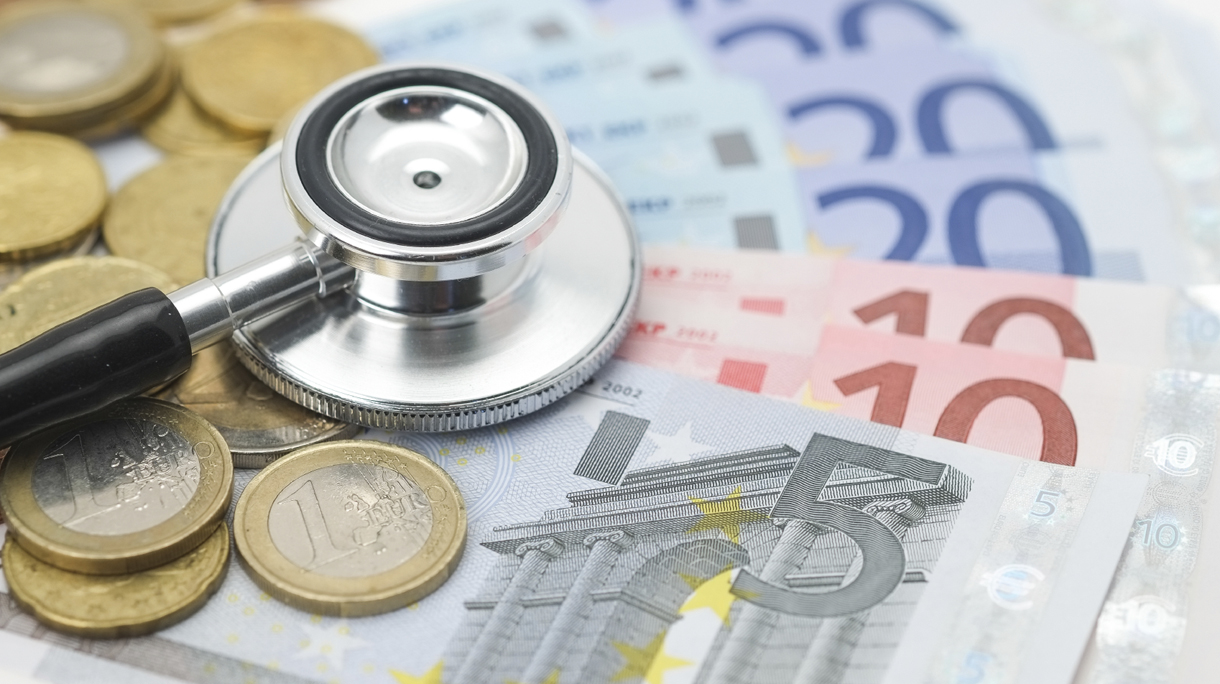 Stethoscope placed on Euro currency
