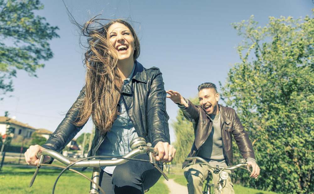 Couple riding on bikes