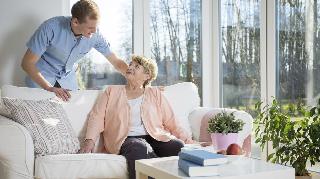 Male nurse caring about patient