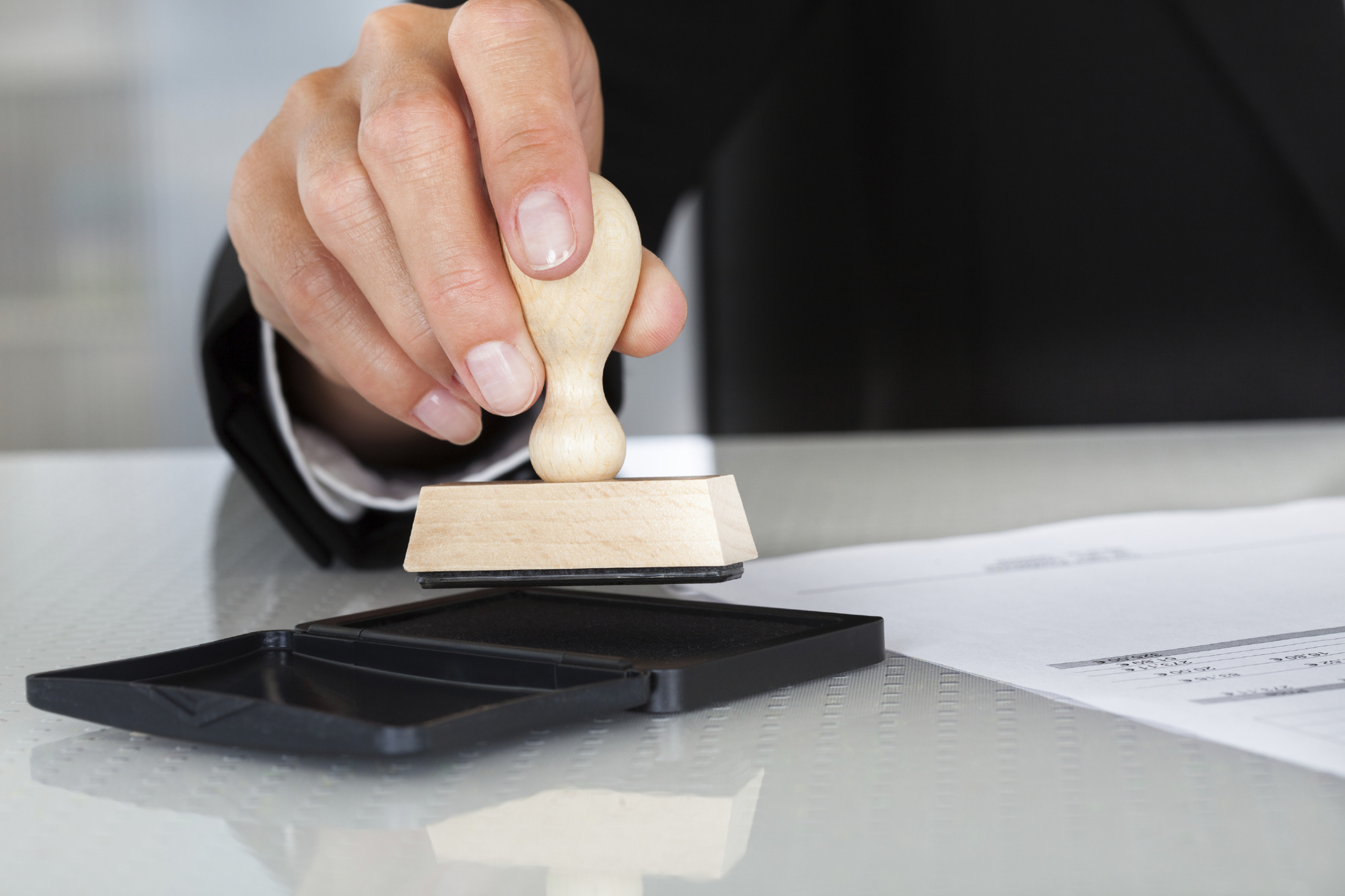 Business Man Hand With Rubber Stamp