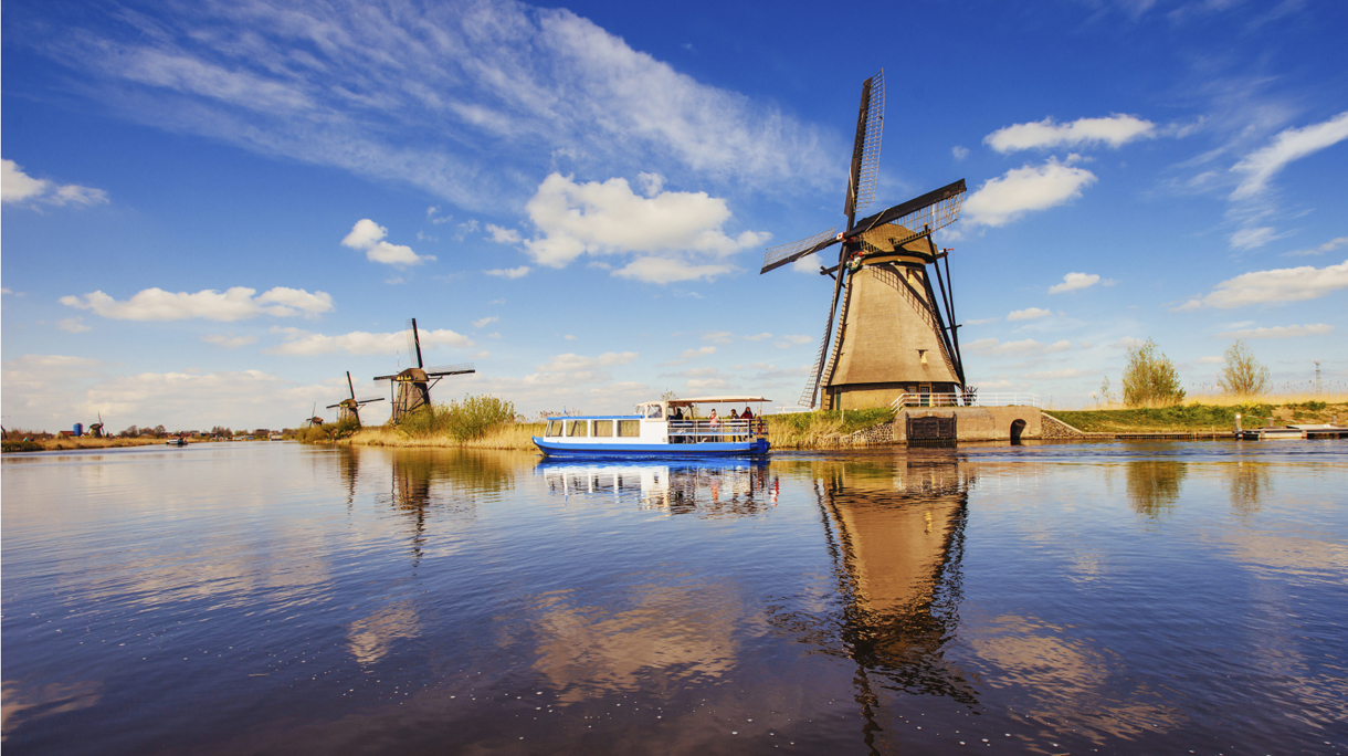 Traditional Dutch windmills from the channel Rotterdam. Holland.