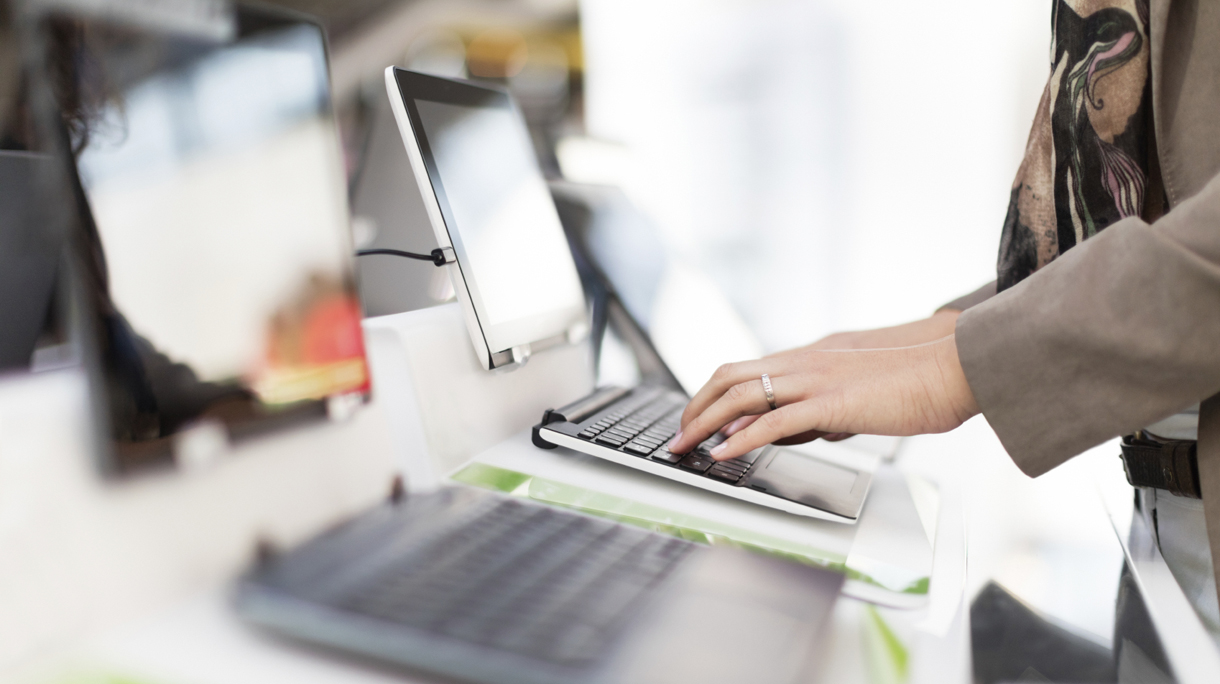 Typing on laptop