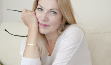 Casual, mature woman relaxing at home