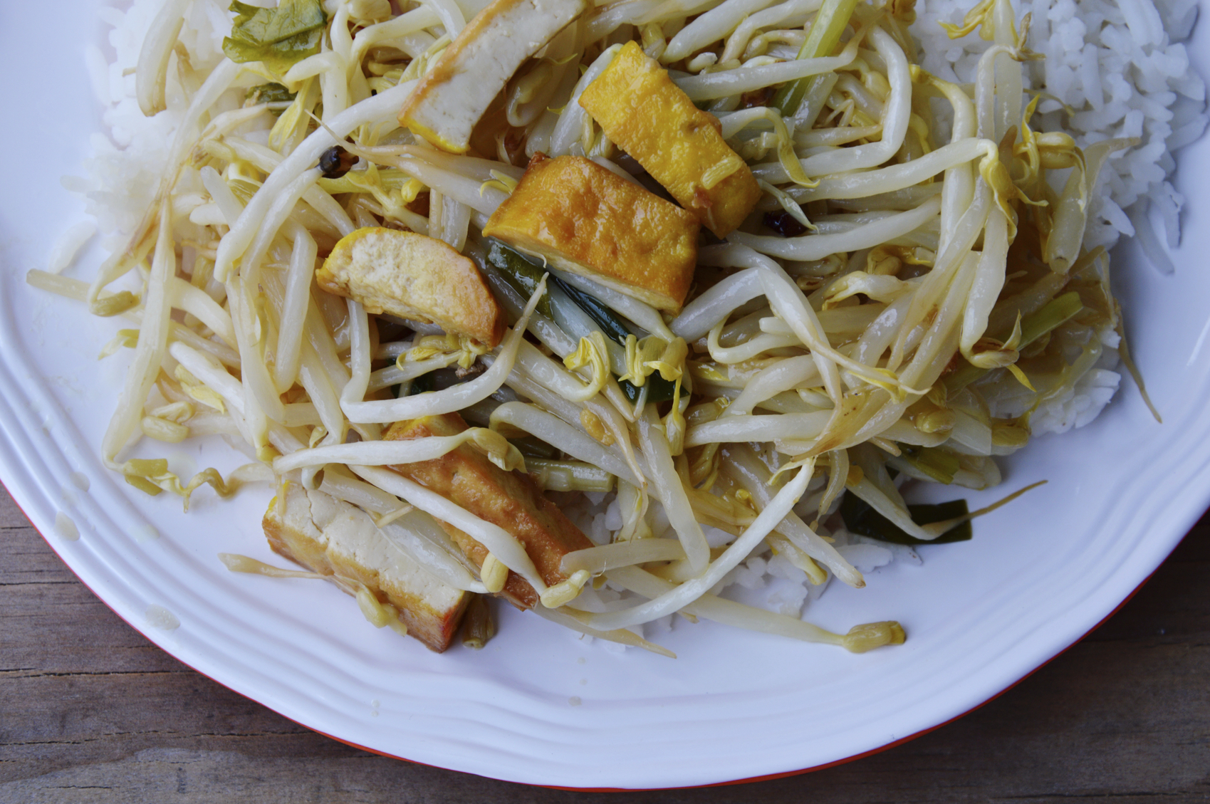 stir-fried bean sprout with yellow tofu on rice