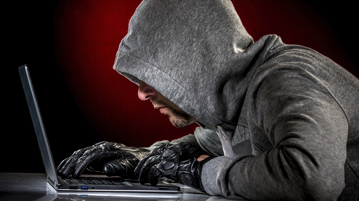 Hacker with laptop