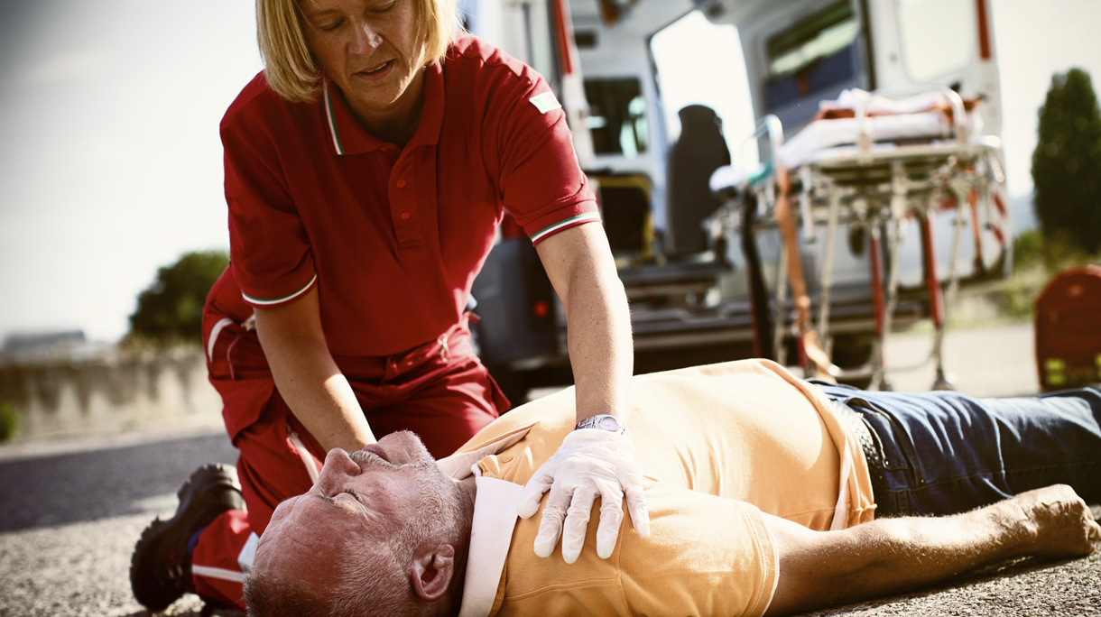 Paramedics succor a man with heart attack