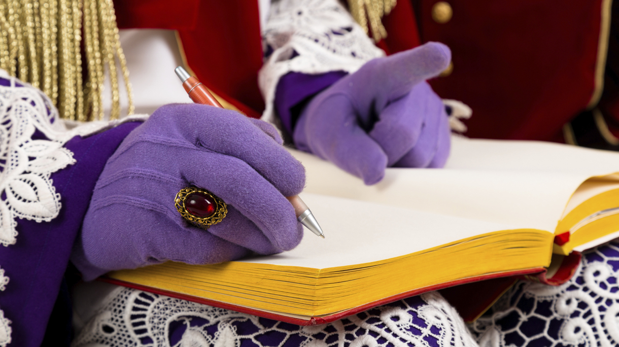 hands of sinterklaas with book