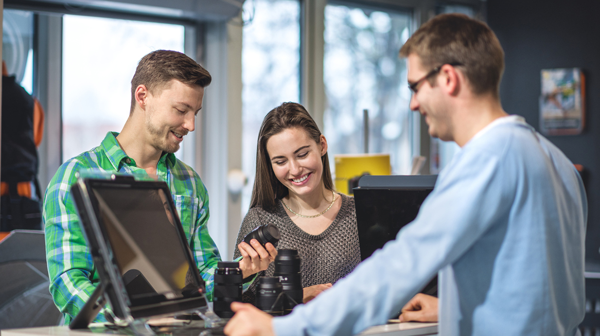 Customer buying camera lenses