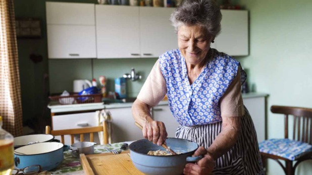 Senior woman baking