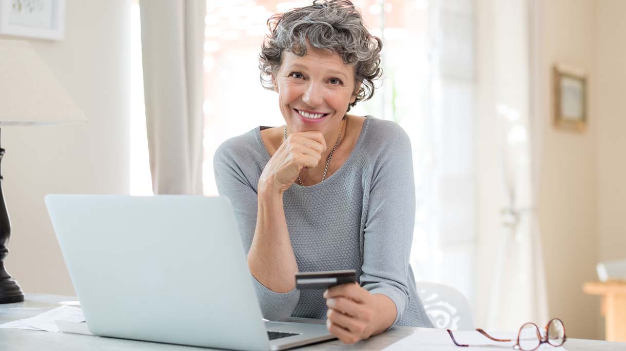 Senior woman shopping online
