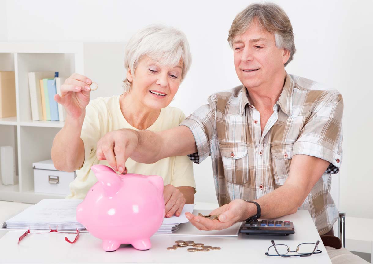 Senior Couple Calculating Coins