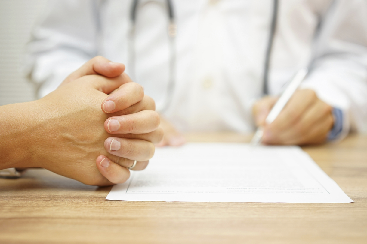 hands of Concerned Women for medical report written by doctor