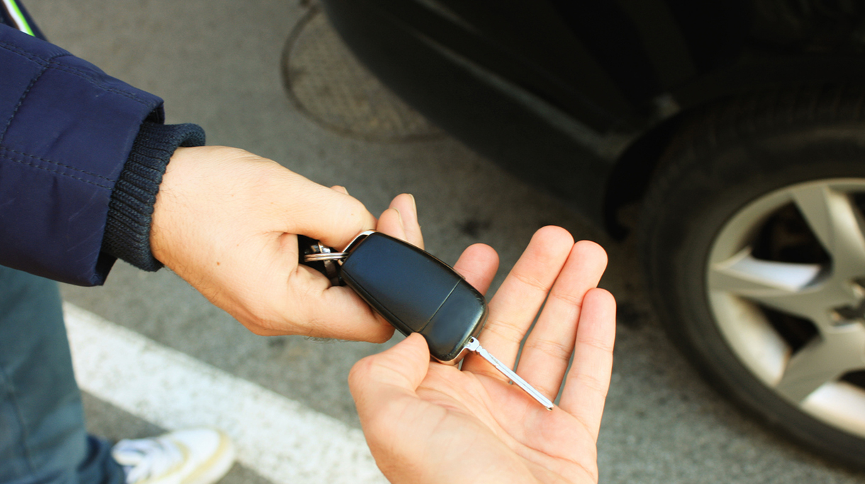 Buyer taking car key