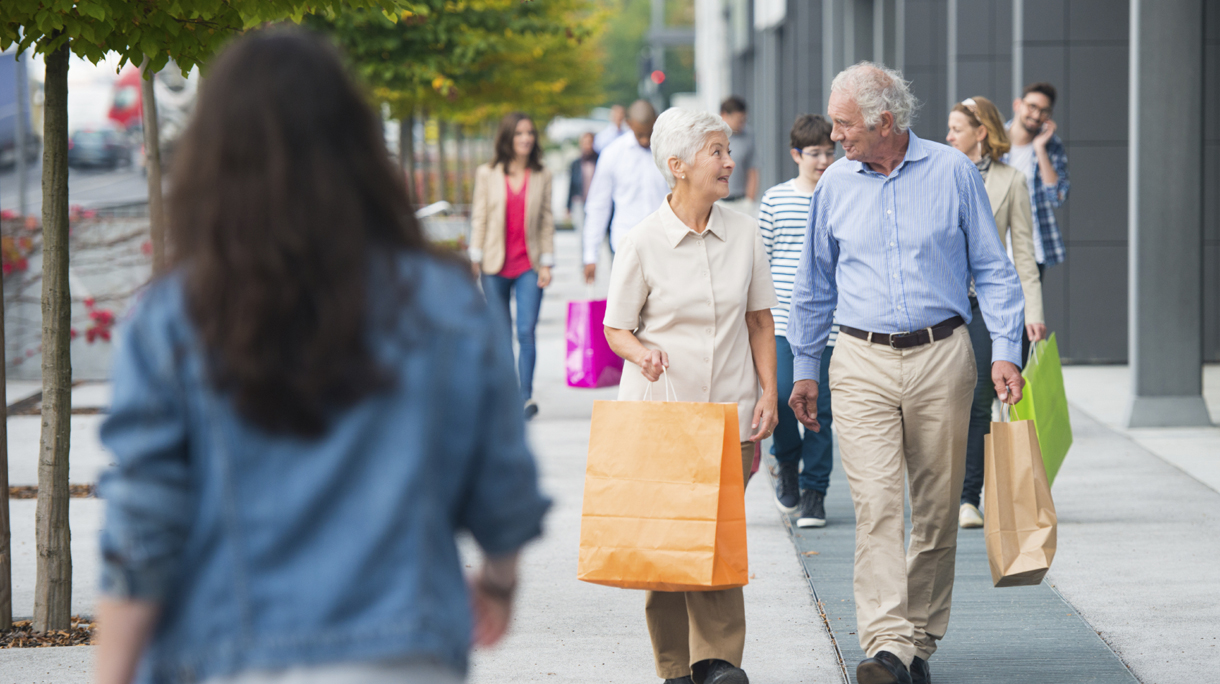 Happy Senior Couple With Shopping Bags
