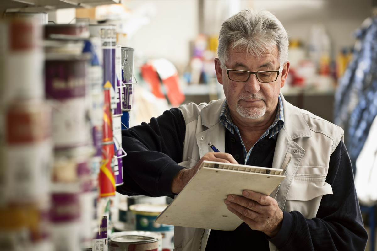 Senior Man Taking Inventory