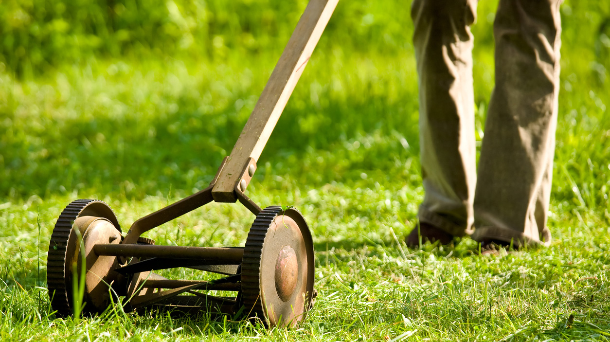 A classic push mower with legs