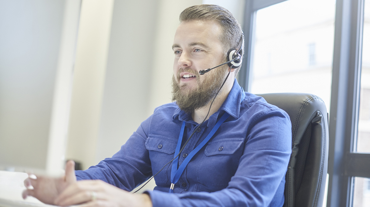 bearded customer service rep