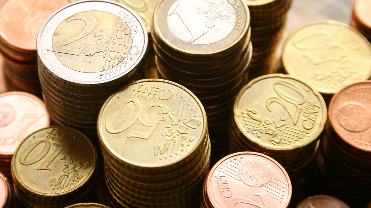 Stacks of Euro coins of different denominations