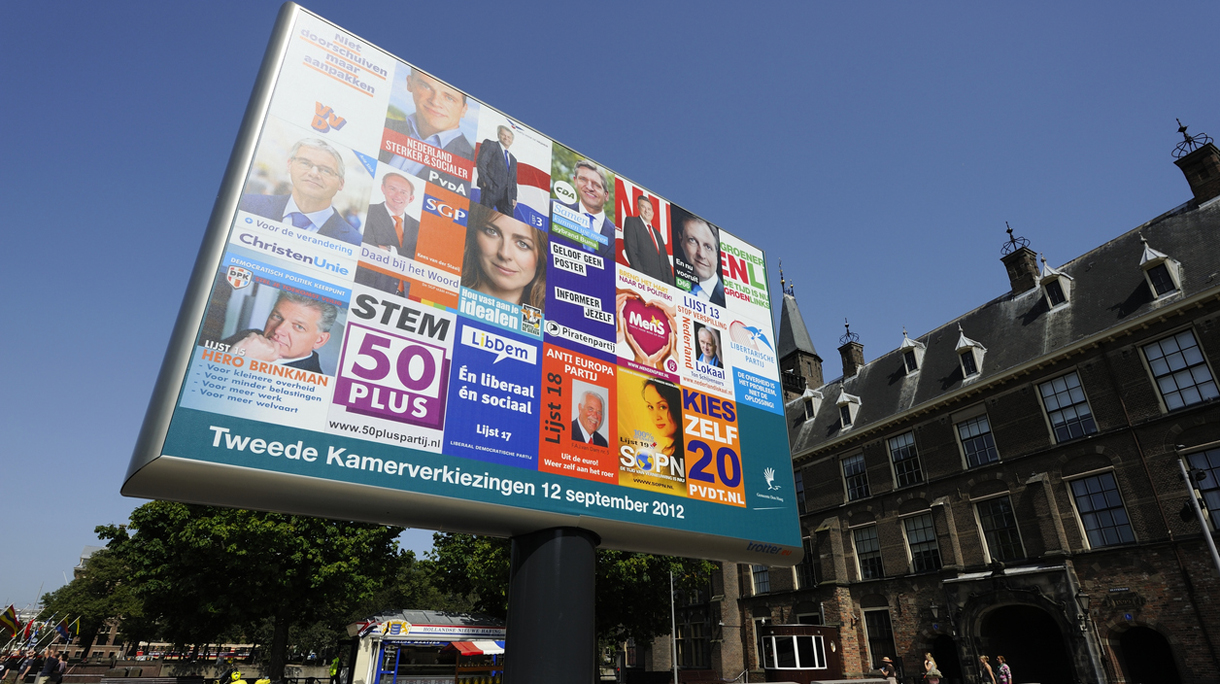 Billboard with election posters in The Hague
