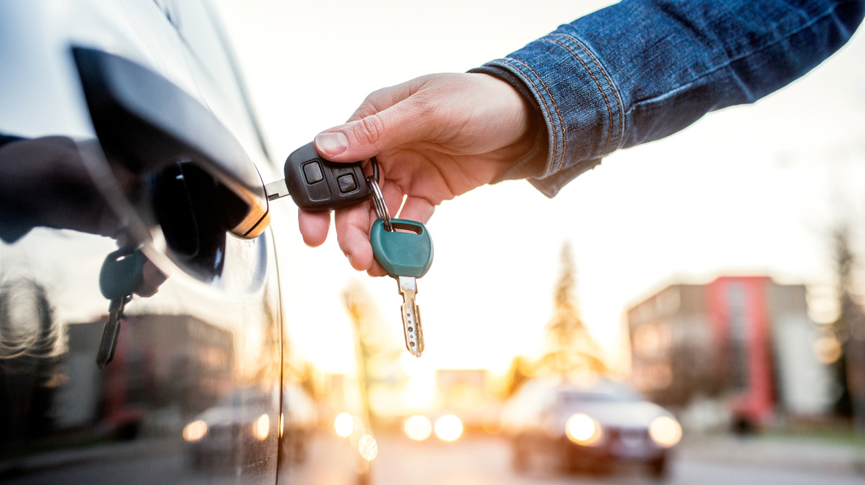 Woman with car key