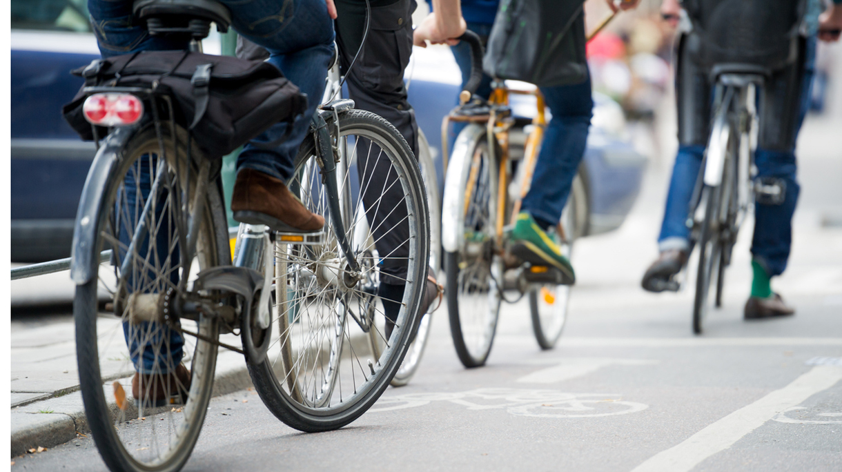 Commuters on bicycle in the city.