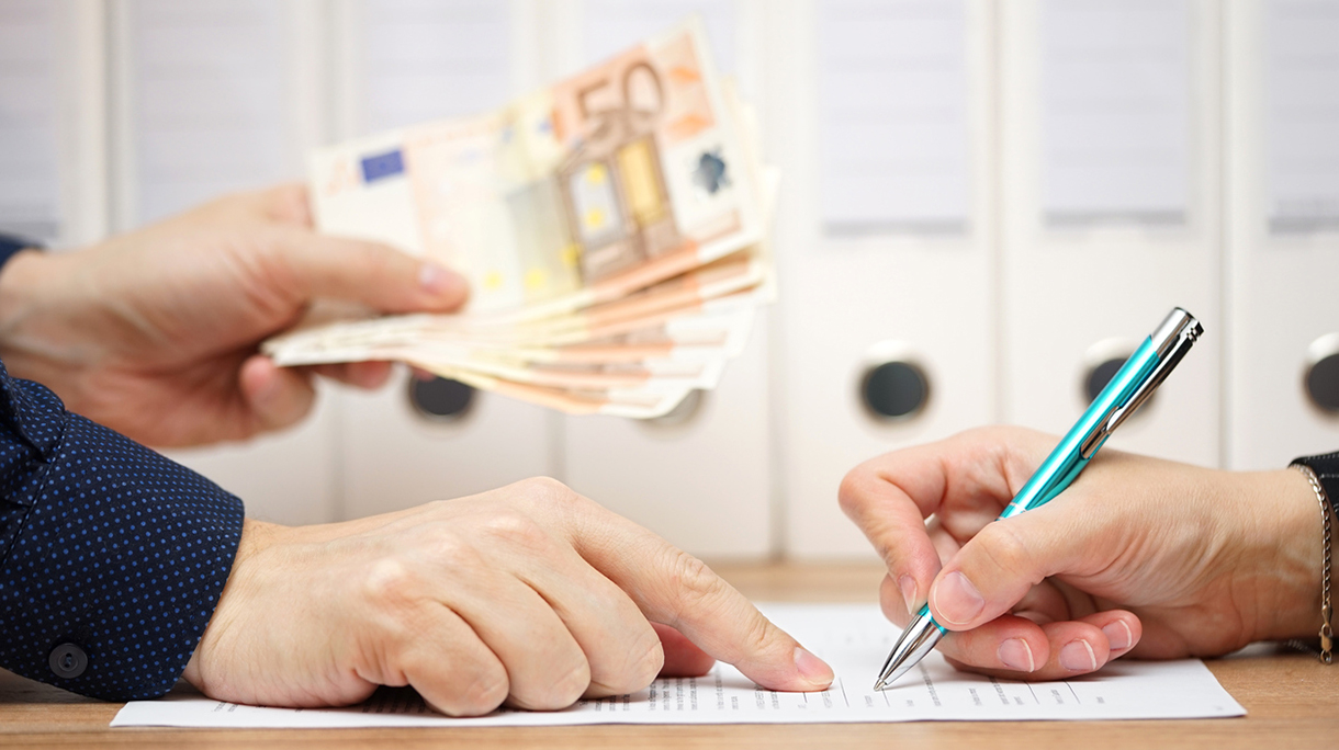 employer or businessman showing where to sign  in exchange