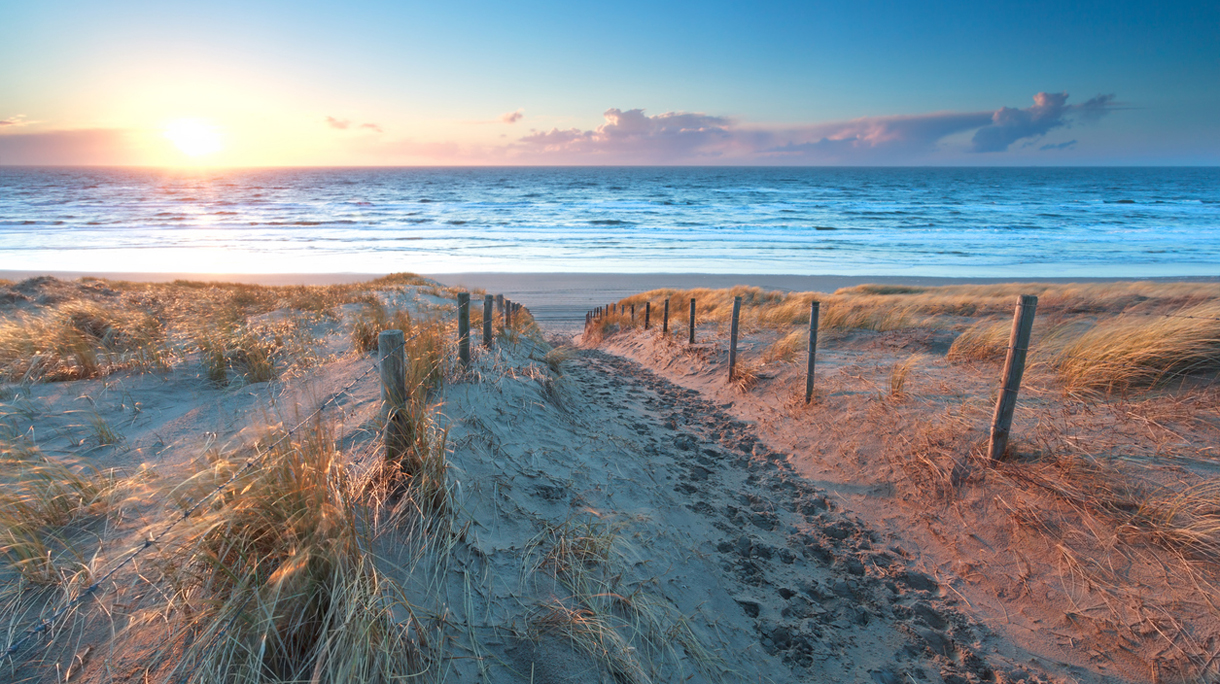 sunshine over the sand path to North sea coast