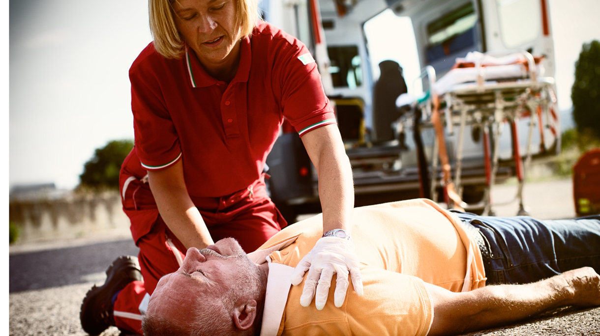Paramedics succor a man with heart attack