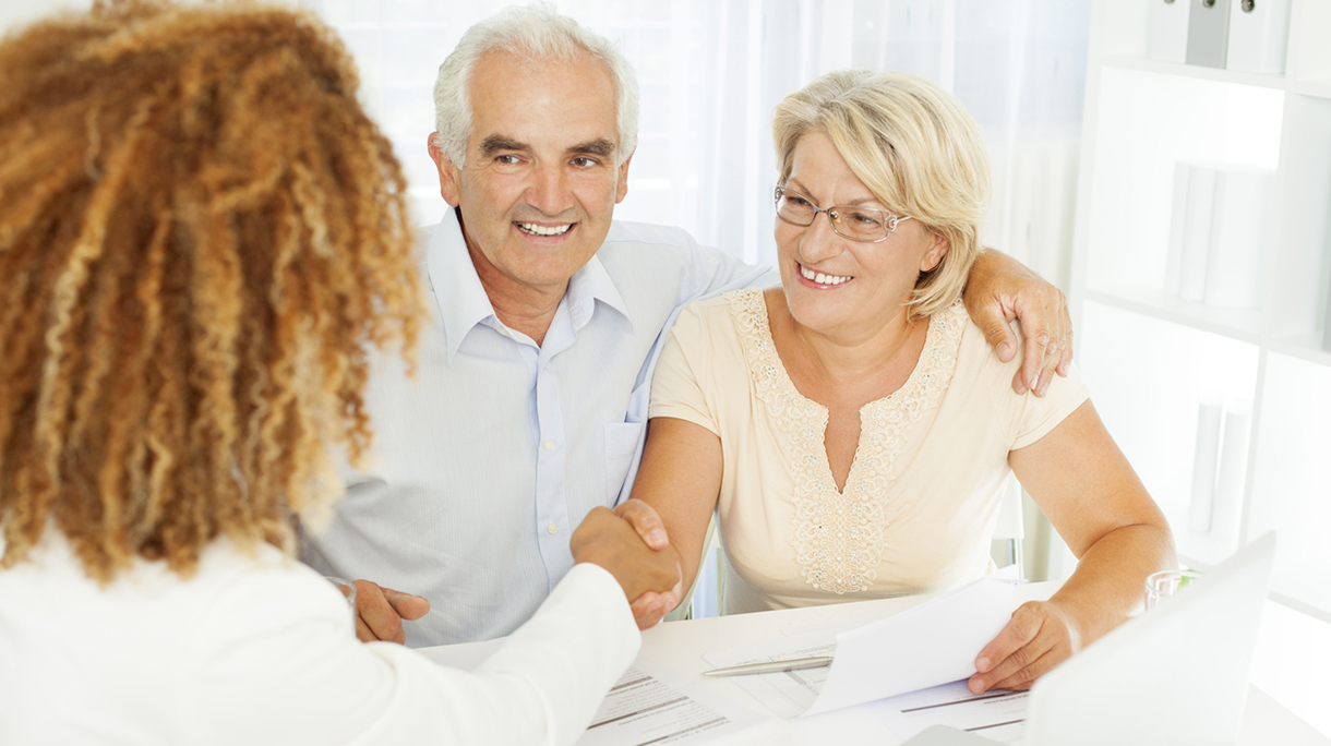 Senior Couple Meeting With Financial Advisor.