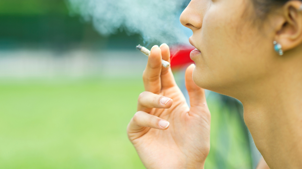 Smoking cannabis.