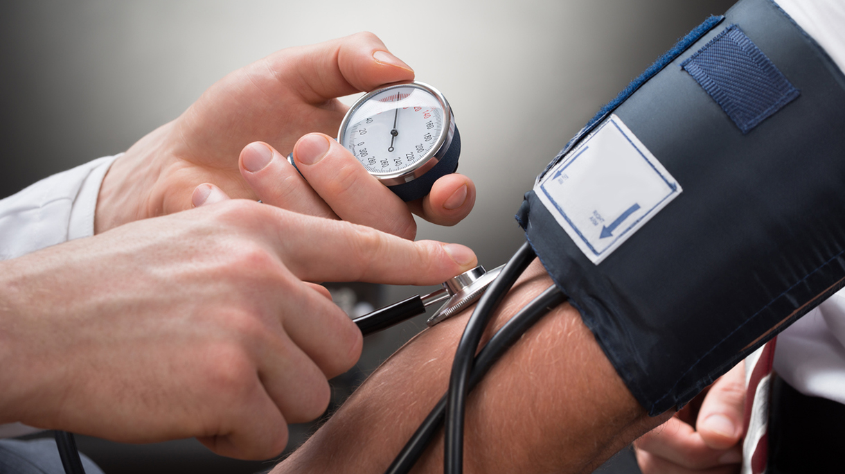 Doctor Checking Blood Pressure Of A Patient